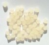 50 6mm Bicone Coated Translucent Light Topaz
